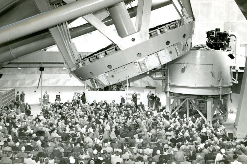 Guests seated inside the dome at the dedication of the Hale Telescope at Palomar Observatory