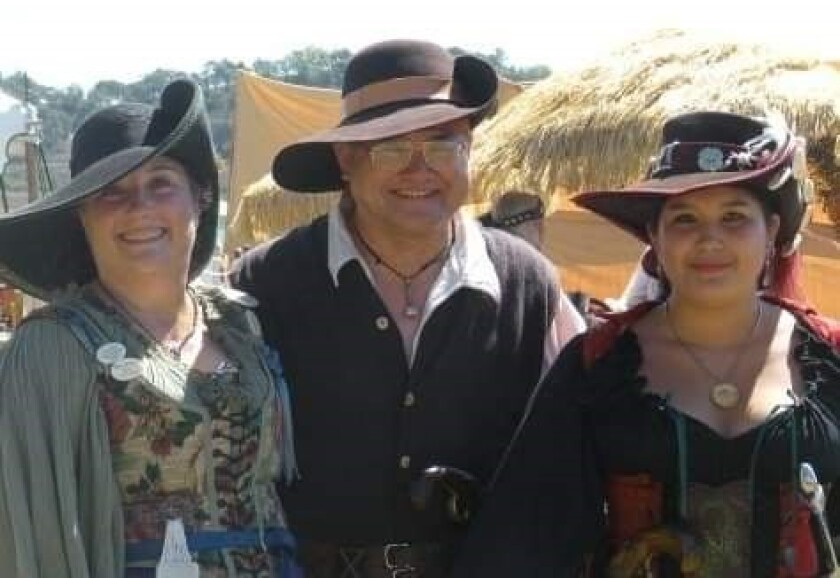 The family was fully dressed out at a Renaissance/Pirate Faire they attended; from left, Julie, Stanley and Katie Tamura.