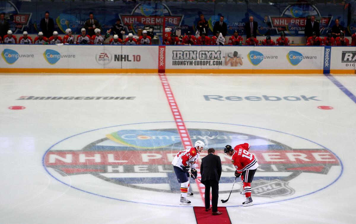 A ceremonial puck drop before the start of a game between the Florida Panthers and Chicago Blackhawks at Hartwall Arena in Helsinki, Finland, in 2009.