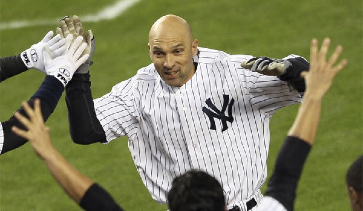 New Angels designated hitter Raul Ibanez celebrates after hitting a walk-off home run for the New York Yankees in 2012.