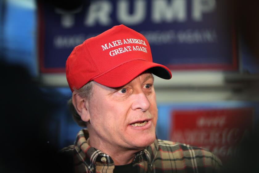 Former MLB pitcher Curt Schilling campaigns for Donald Trump on Oct. 18, 2016, in Salem, N.H.
