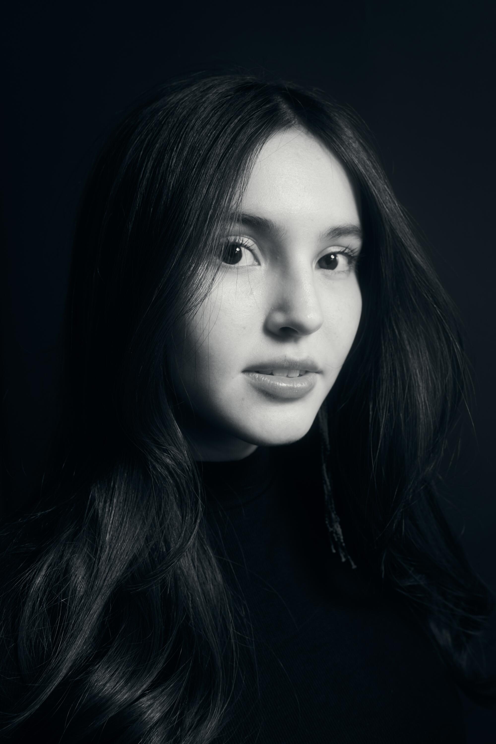 Isabel Deroy-Olson in a dark top.