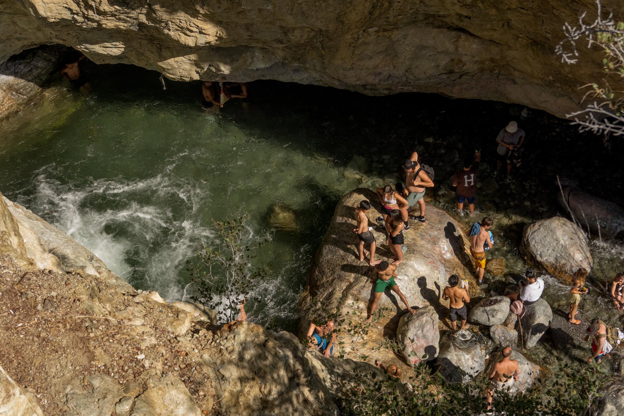 A weekend crowd gathers at Stoddard Canyon Falls and Slide in Mt. Baldy.
