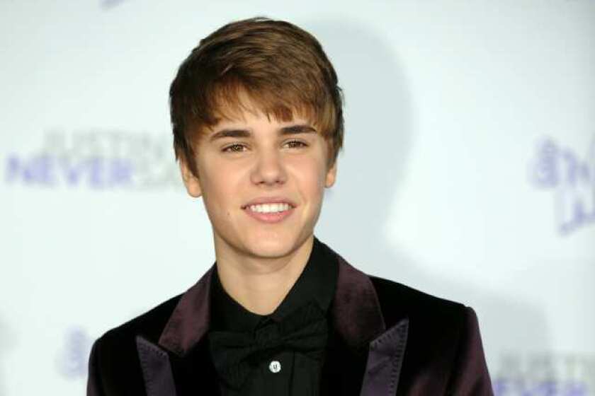 Singer Justin Bieber arrives at the premiere of "Justin Bieber: Never say Never" in Los Angeles, California on February 8, 2011.
