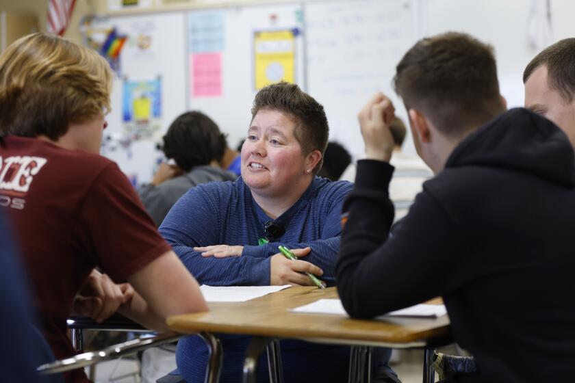 San Diego, CA - May 30: Grossmont High math teacher Kristen LoPrell works with students in her AP calculus class on Thursday May 30, 2024. LoPrell was named one of five San Diego County Office of Education teachers of the year. (K.C. Alfred / The San Diego Union-Tribune)