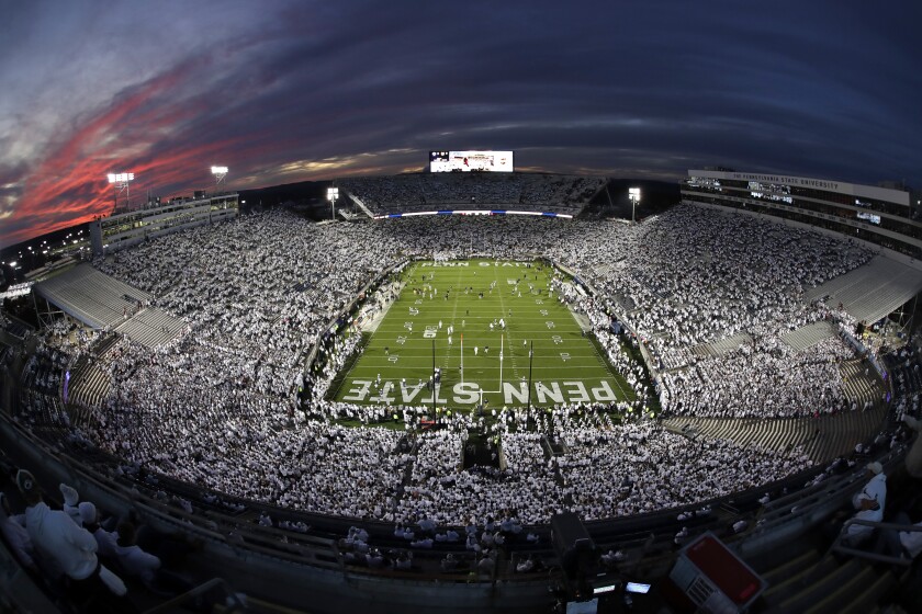 The sun sets on Beaver Stadium during warmups before a game between Penn State and Michigan.