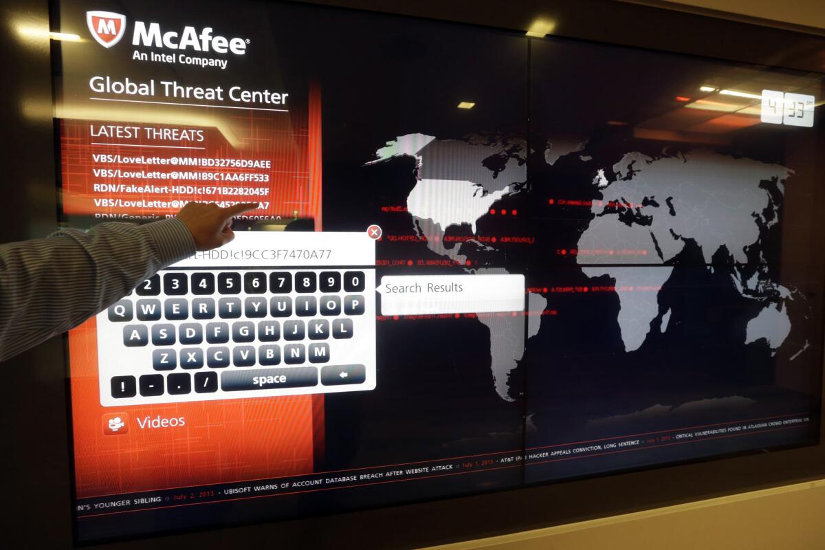A global map tracks computer virus activity at the McAfee headquarters in Santa Clara.