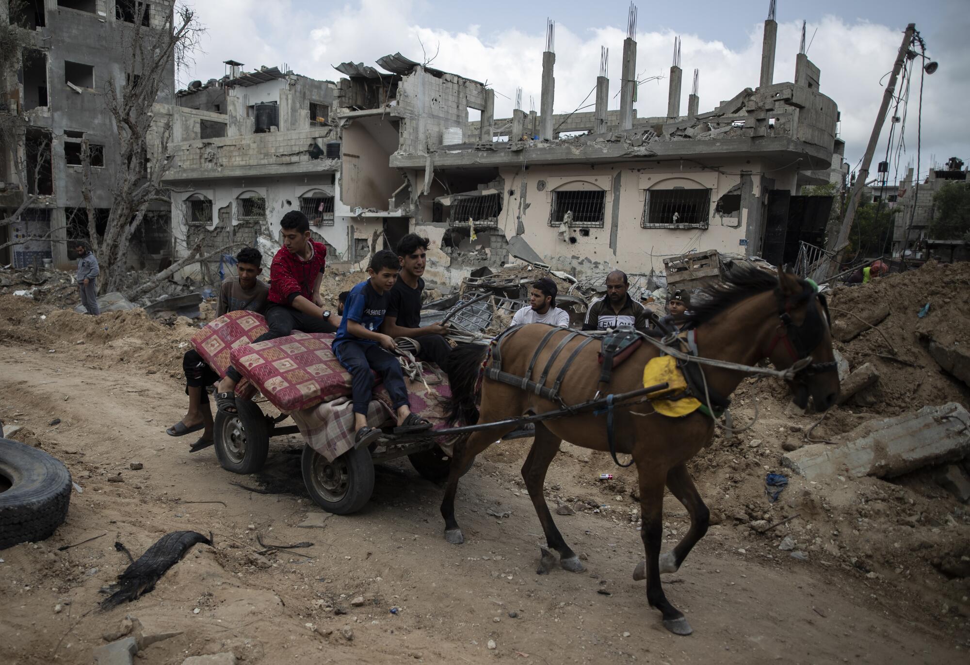 Palestinians on a horse cart in Beit Hanoun in 2021.