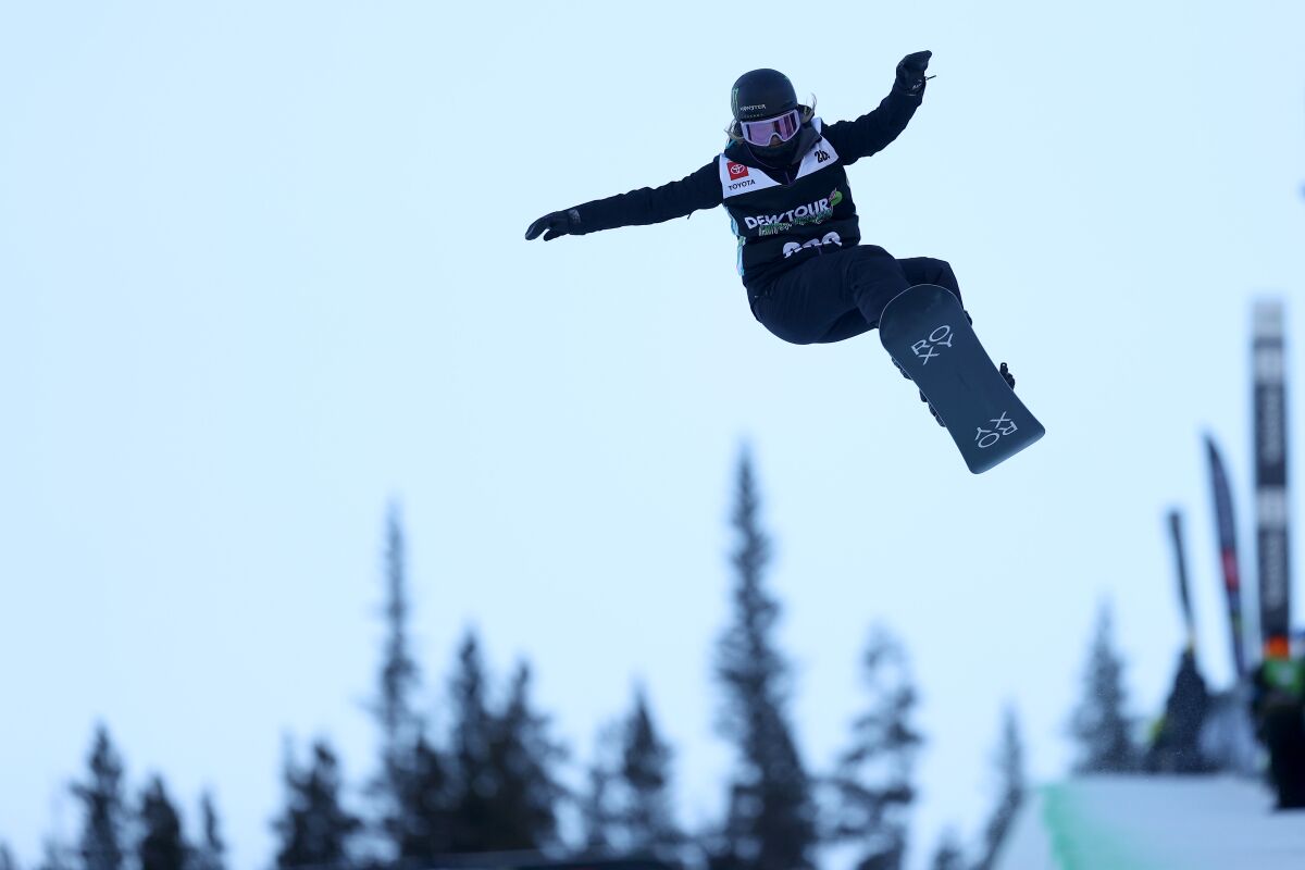 Chloe Kim of Team United States catches air before the women's snowboard superpipe final