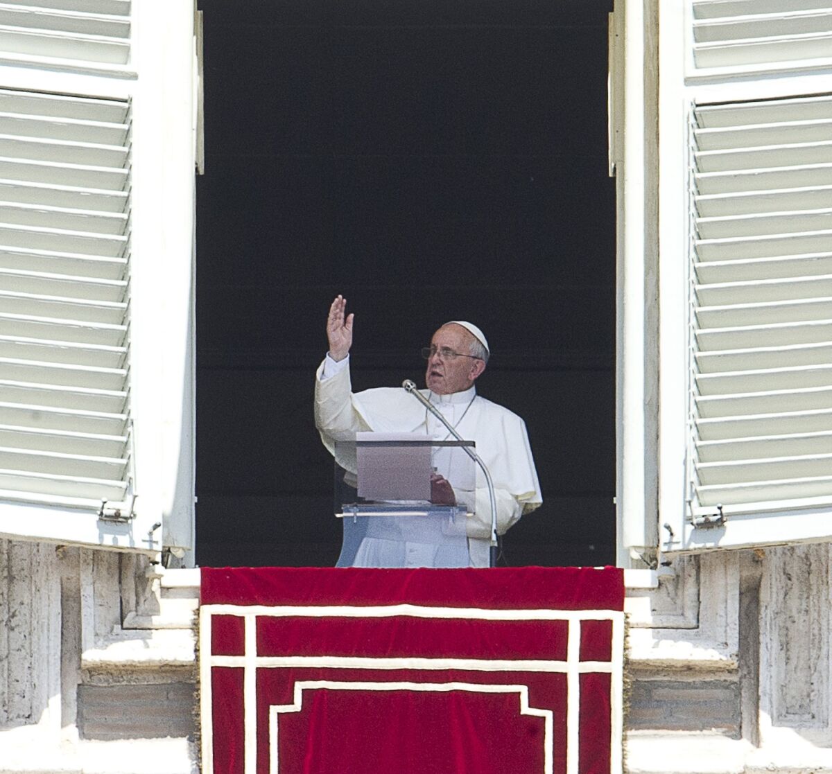 Pope Francis gives the Angelus prayer from the window of the apartments at St Peter's square on at the Vatican.