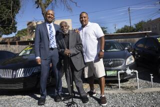 MODESTO CA JULY 28, 2023 - From left are the Wilsons: Jacque, a San Francisco public defender, dad Mack, 88, a war veteran, and Neko. Jacque said he and his father, Mac, pushed the SB bill through that freed his brother, Neko, and hundreds of other California inmates who are accomplices in murder cases. Neko now runs a family car dealership on Friday, July 28, 2023, in Modesto, Calif. (Paul Kuroda/ For The Times)