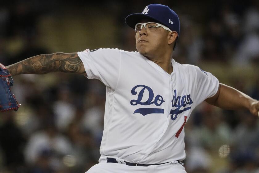 LOS ANGELES, CA, MONDAY, APRIL 1, 2019 - Dodgers starting pitcher Julio Urias pitches in the first inning against the Giants at Dodger Stadium. (Robert Gauthier/Los Angeles Times)