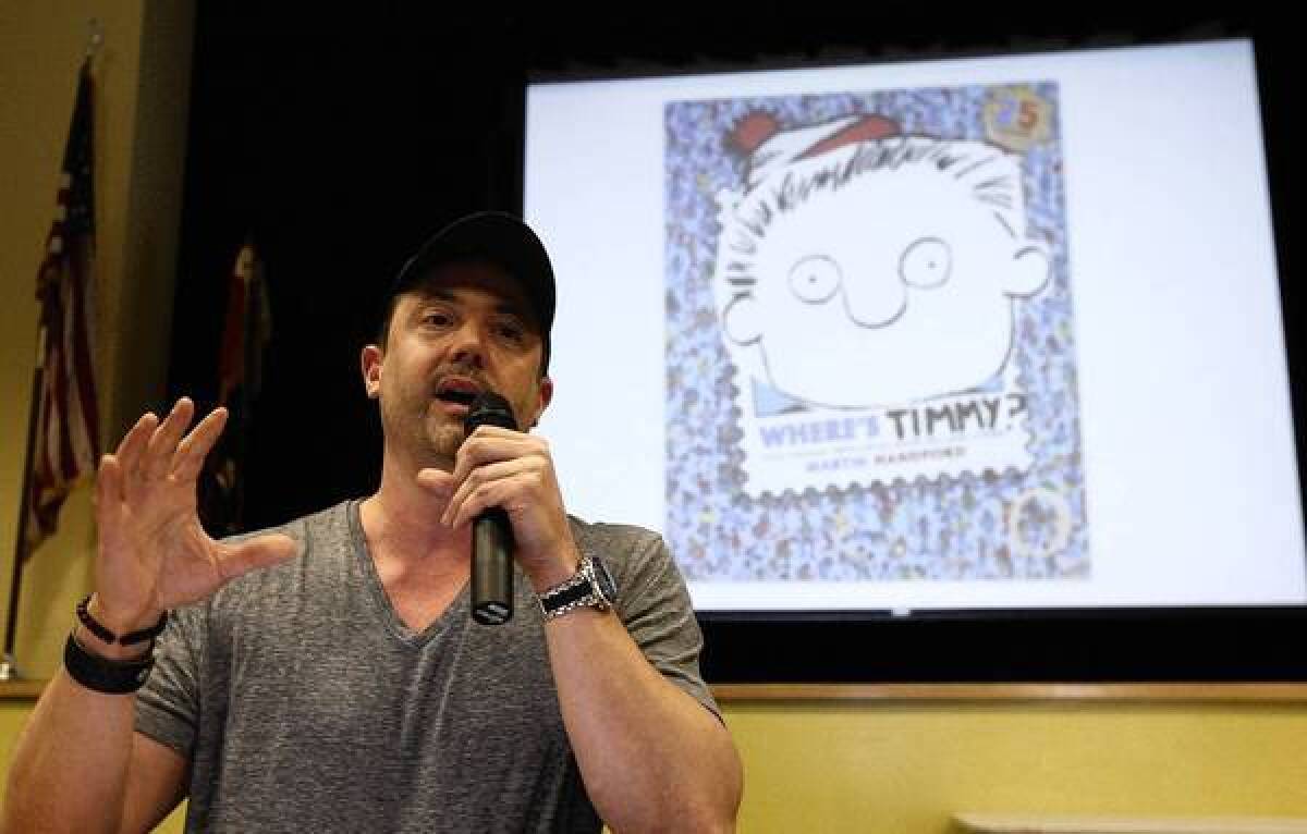 "Pearls Before Swine" cartoonist Stephan Pastis talks to pupils at Carver Elementary School in San Marino, his alma mater, about his illustrated book, "Timmy Failure."