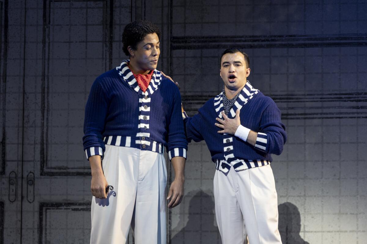 Justin Austin, left, and Anthony Leon successful L.A. Opera's "Così instrumentality Tutte."