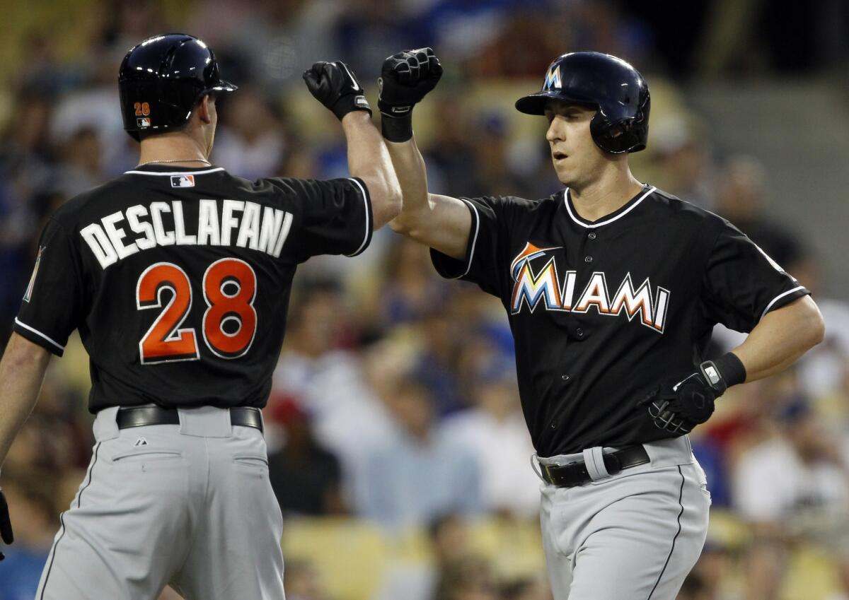 Ed Lucas' two-run home run in the second inning was one of the Marlins' three bombs en route to a 13-3 win Wednesday over the Dodgers.