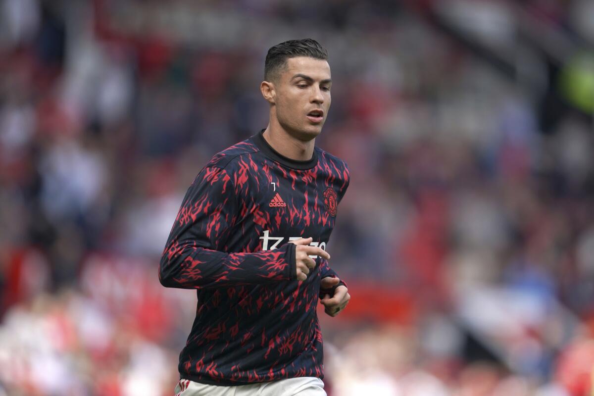 Manchester United's Cristiano Ronaldo warms up before a match in April.