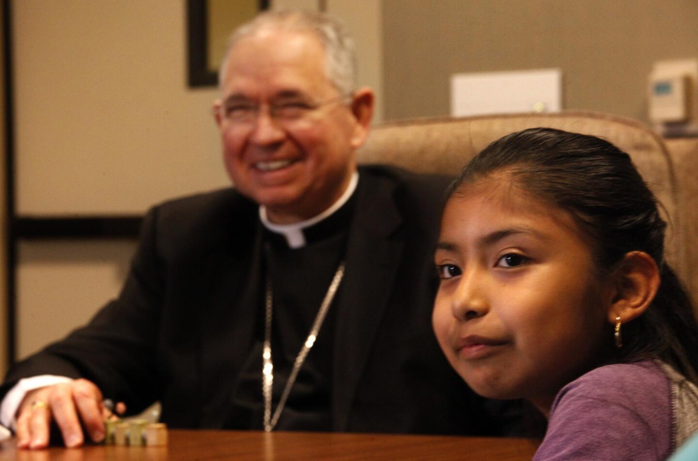 Los Angeles Archbishop Jose Gomez meets with Jersey Vargas, 10.