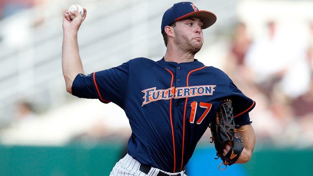 Cal State Fullerton pitcher Colton Eastman delivers against Mississippi State during their NCAA Regional Baseball Tournament game on June 4, 2016.