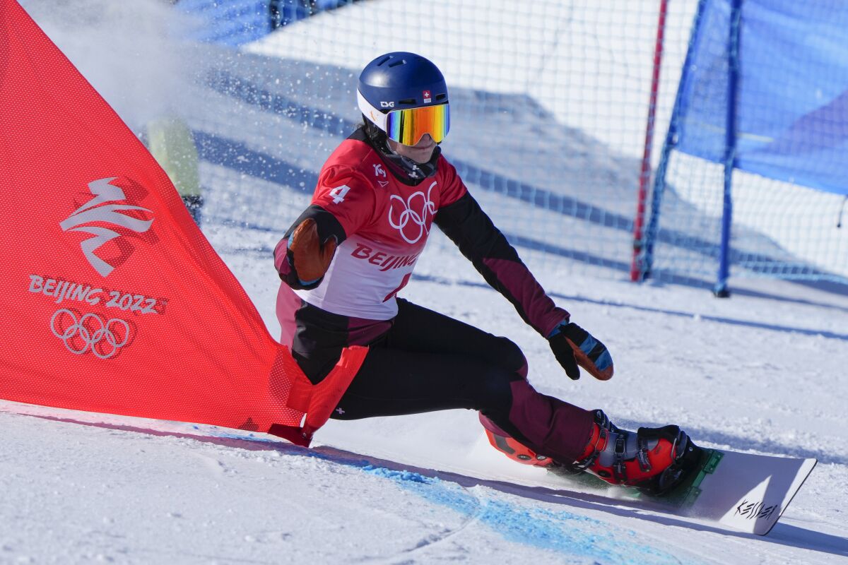 Switzerland's Patrizia Kummer competes during the women's parallel giant slalom elimination run at the 2022 Winter Olympics, Tuesday, Feb. 8, 2022, in Zhangjiakou, China. (AP Photo/Lee Jin-man)