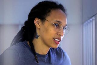 US Women's National Basketball Association (WNBA) basketball player Brittney Griner, who was detained at Moscow's Sheremetyevo airport and later charged with illegal possession of cannabis, waits for the verdict inside a defendants' cage during a hearing in Khimki outside Moscow, on August 4, 2022. - A Russian court found Griner guilty of smuggling and storing narcotics after prosecutors requested a sentence of nine and a half years in jail for the athlete. (Photo by EVGENIA NOVOZHENINA / POOL / AFP) (Photo by EVGENIA NOVOZHENINA/POOL/AFP via Getty Images)