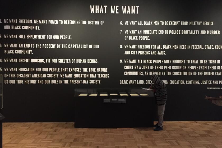 In a new exhibit, the Oakland Museum of California explores the Black Panther Party, founded in North Oakland in 1966. Its seminal document, the 10-Point Program, is replicated on the wall. The display case contains a draft of the original, written by Huey Newton and Bobby Seale.