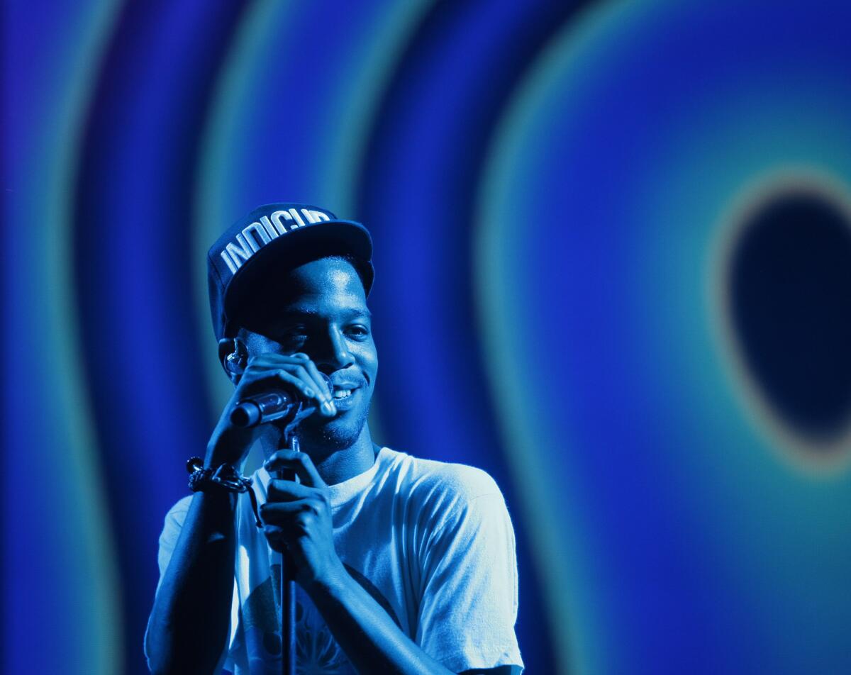 Kid Cudi performs at the Rock the Bells festival in San Bernardino in 2012. On Tuesday, the artist announced he is seeking treatment for depression.