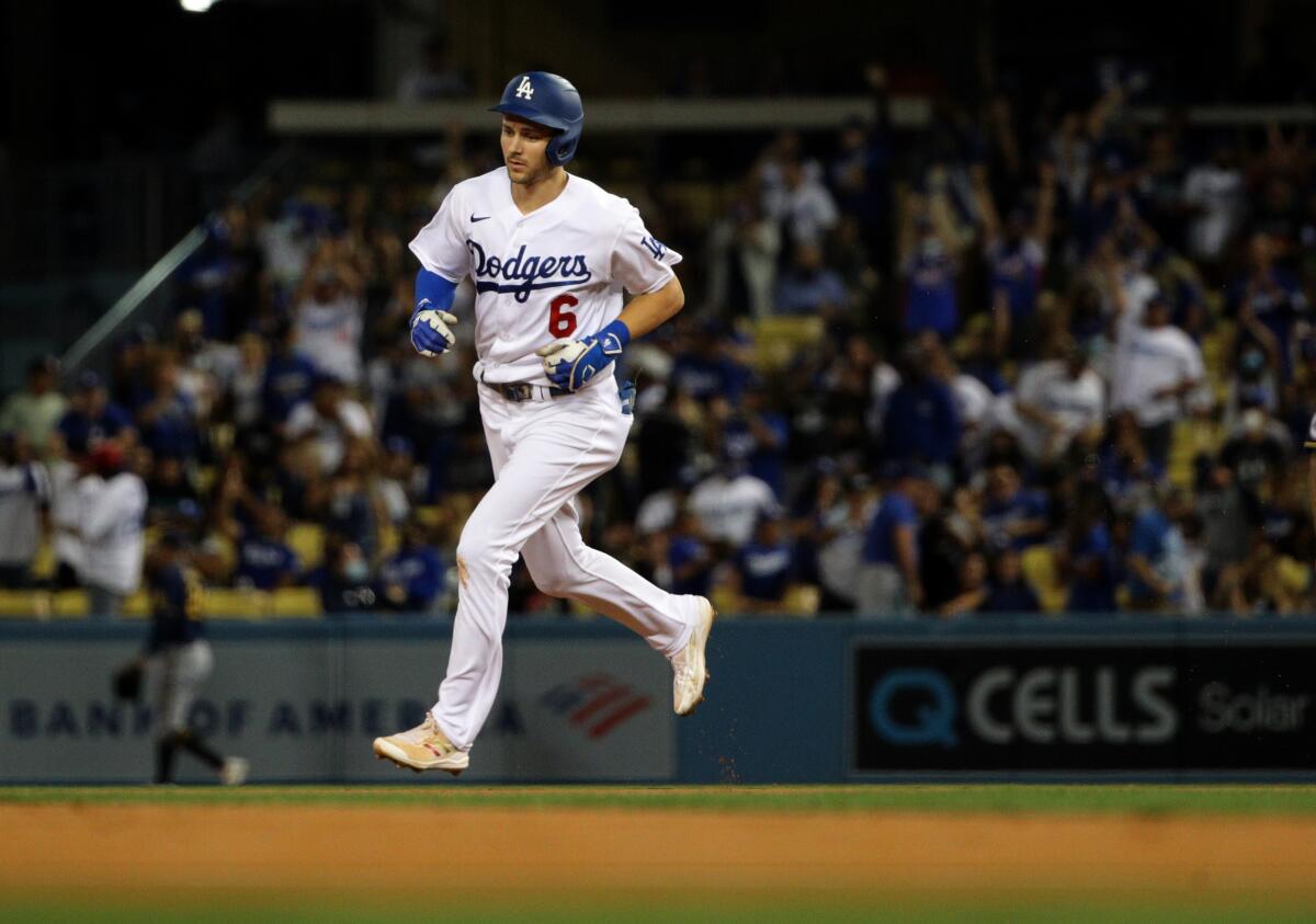 Dodgers shortstop Trea Turner runs the bases after hitting a solo home run in the first inning Friday.