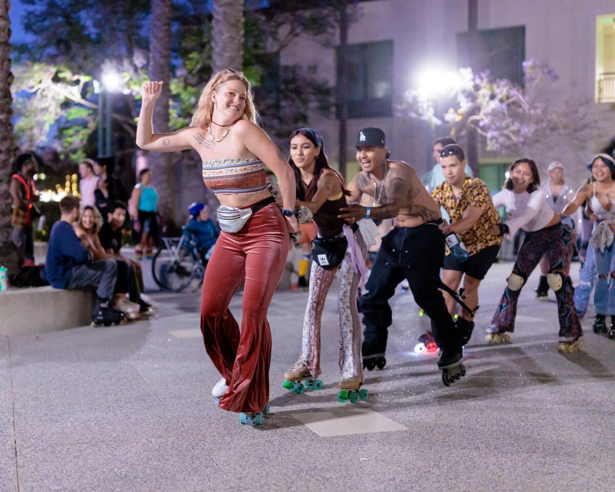 A line of skaters at an event cohosted by the L.A. Skate Hunnies and Ivy Station in Culver City on July 6.