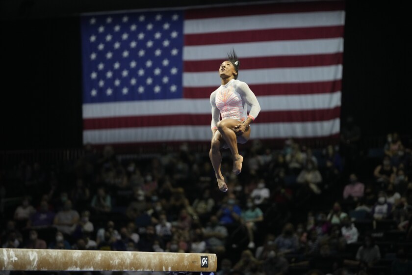 Simone Biles performs her balance beam routine during the U.S. Classic gymnastics competition May 22 in Indianapolis.