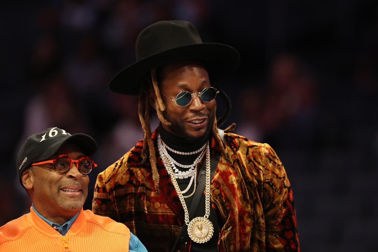 Director Spike Lee and rapper 2 Chainz watch the skills competition.