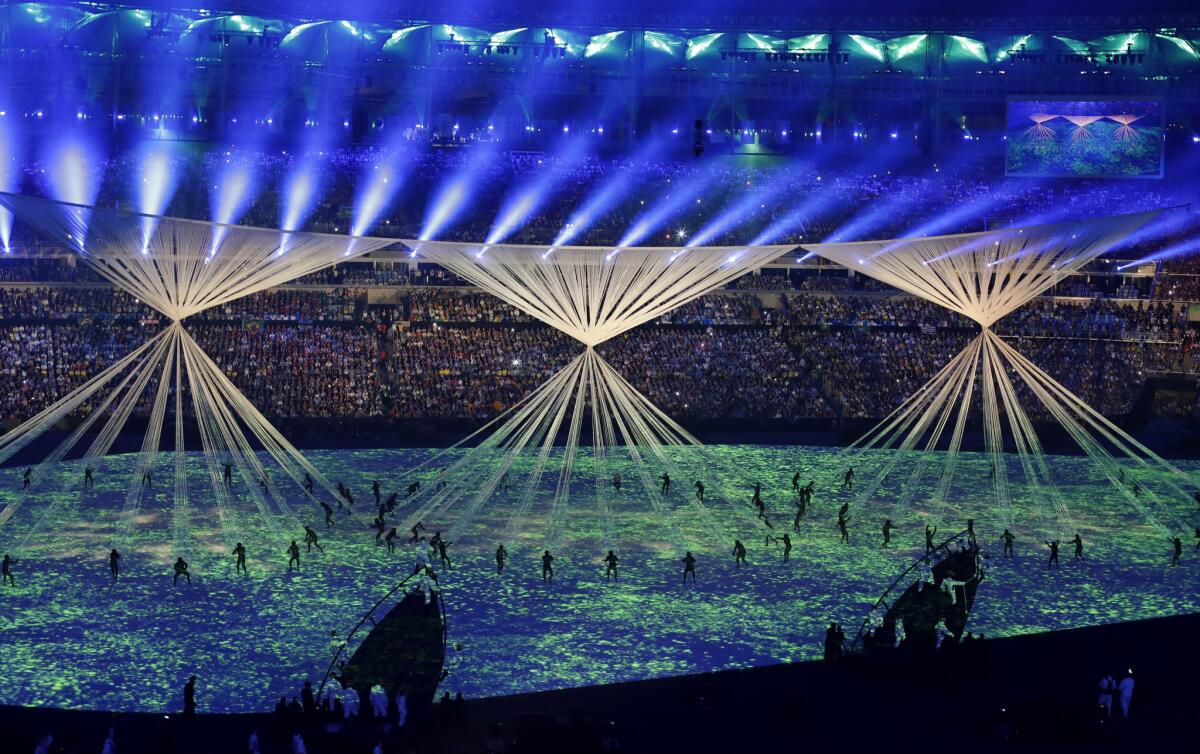 Dancers perform during the opening ceremony at the Rio Olympics on Friday night.