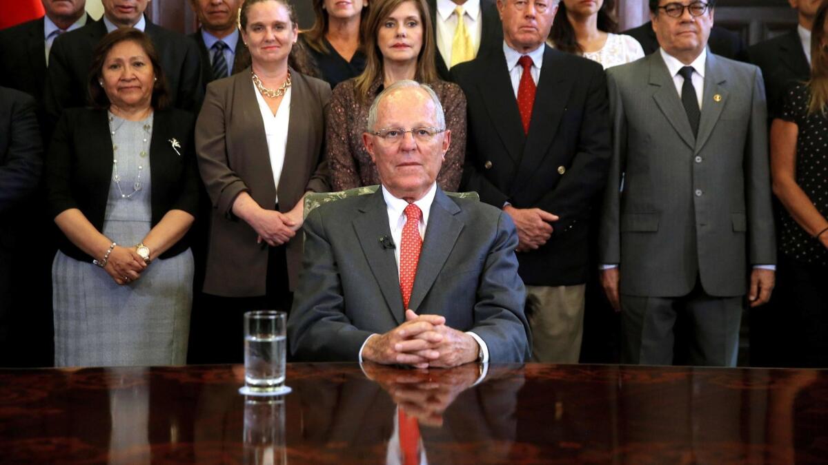Peruvian President Pedro Pablo Kuczynski with his Cabinet at the Government Palace in Lima before announcing his resignation in a televised address to the nation.