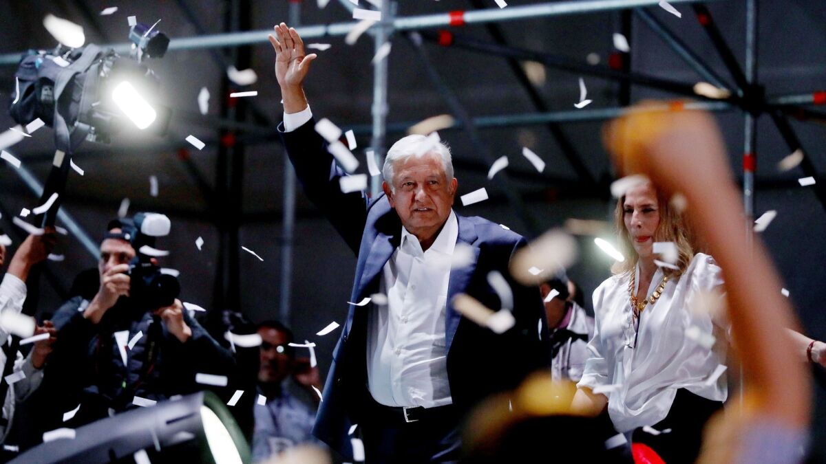 Andres Manual Lopez Obrador celebrates his election as the next Mexican president with supporters at the Mexico City's Zocalo, or central plaza, on Sunday.