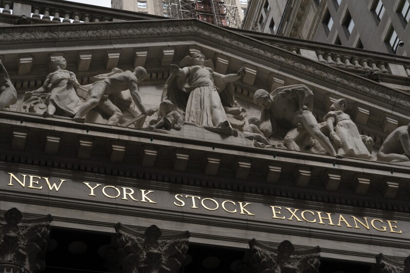 FILE - The front of the New York Stock Exchange is shown, Monday, May 24, 2021. Stocks are opening solidly higher on Wall Street Friday, June 11 keeping the S&P 500 on track for its third weekly gain in a row. The benchmark index was up 0.1%. (AP Photo/Mark Lennihan, File)