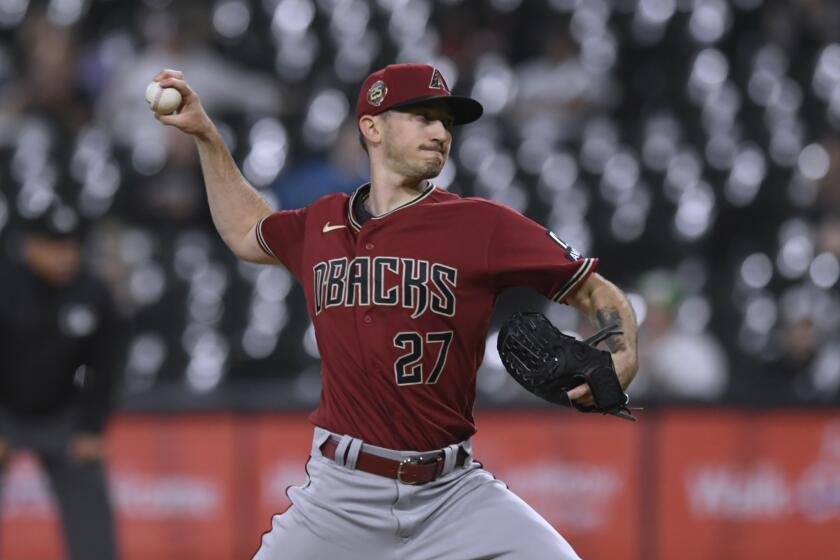 Arizona Diamondbacks starter Zach Davies delivers a pitch during the first inning of the team's baseball game against the Chicago White Sox on Tuesday, Sept. 26, 2023, in Chicago. (AP Photo/Paul Beaty)
