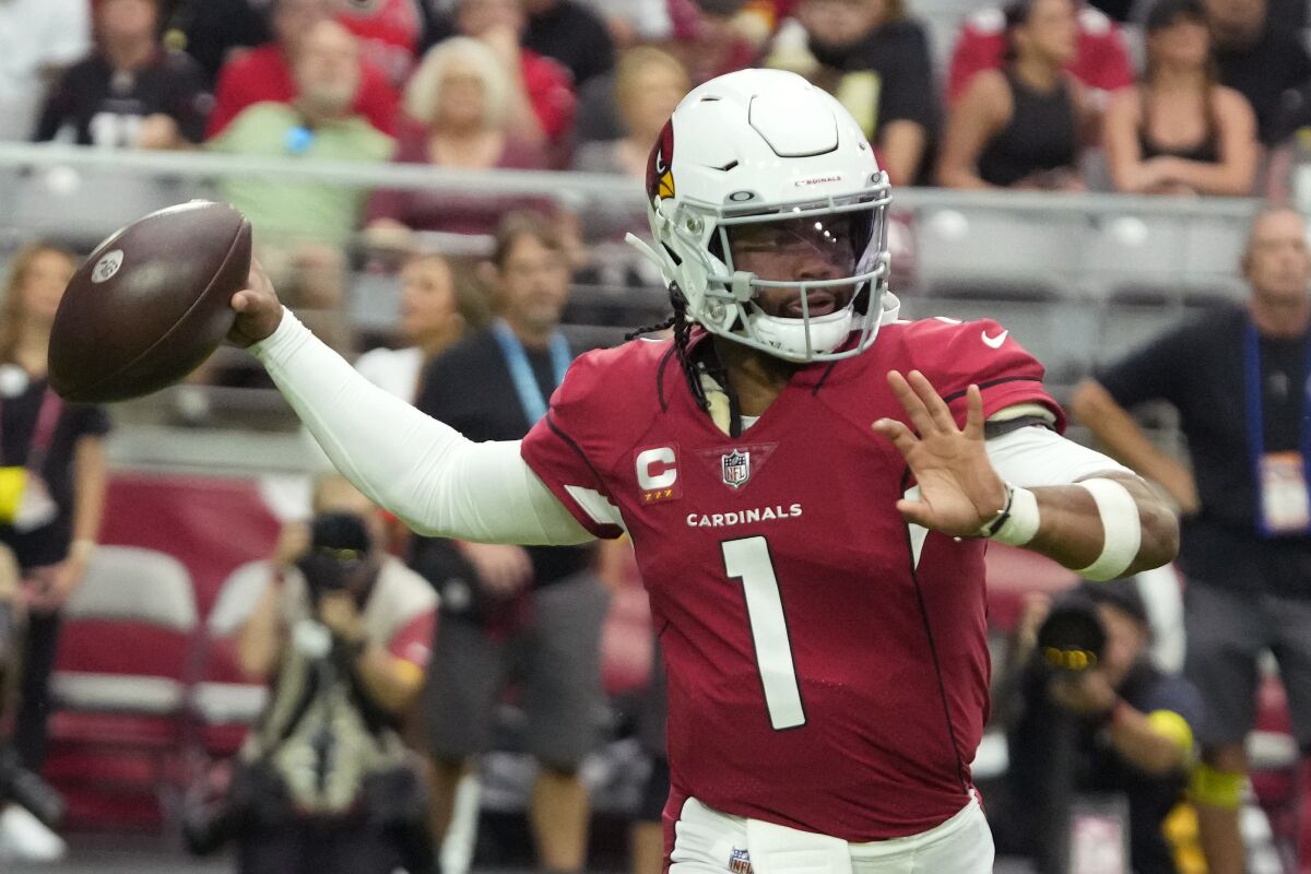 Arizona Cardinals quarterback Kyler Murray (1) throws against the Los Angeles Rams during the first half of an NFL football game, Sunday, Sept. 25, 2022, in Glendale, Ariz. (AP Photo/Rick Scuteri)