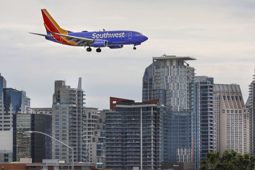 SAN DIEGO, CA 2/1/2019: A Southwest Airlines Boeing 737 passes in front of the downtown San Diego skyline moments before landing at San Diego International Airport. Photo by Howard Lipin/San Diego Union-Tribune/Mandatory Credit: HOWARD LIPIN SAN DIEGO UNION-TRIBUNE/ZUMA PRESS