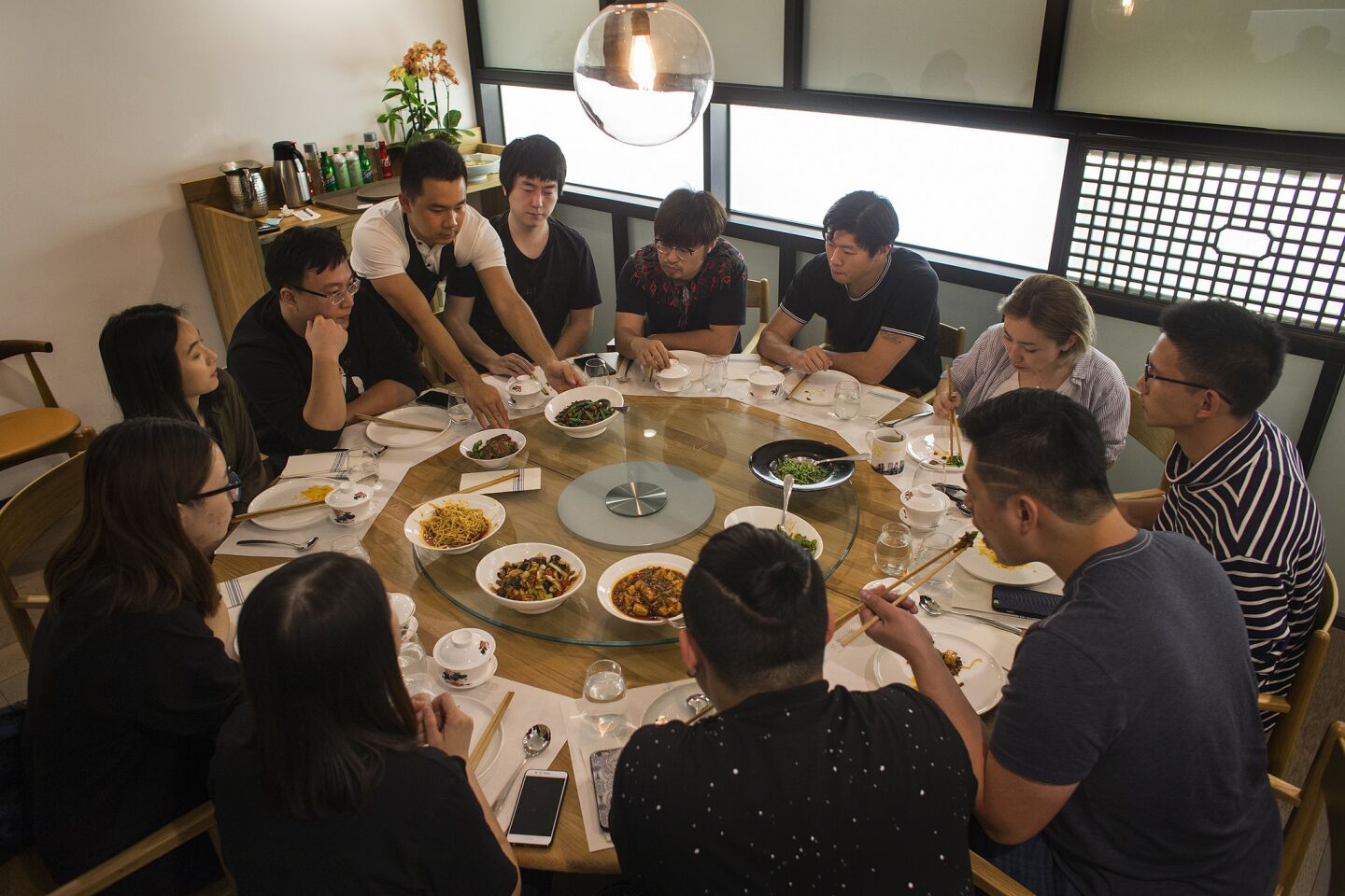 Customers try a variety of Sichuan dishes in one of the private dining rooms.