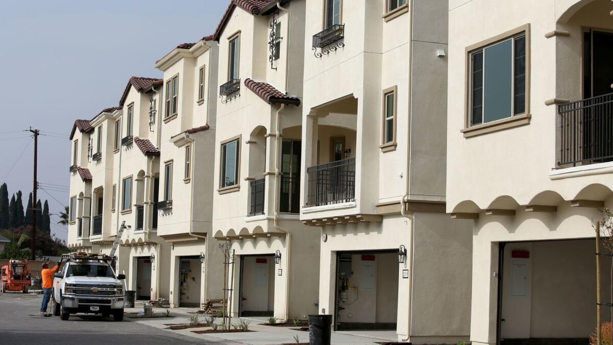 A new townhome community under construction in Anaheim in 2016. One factor holding back the California economy is a shortage of high density housing, experts say.