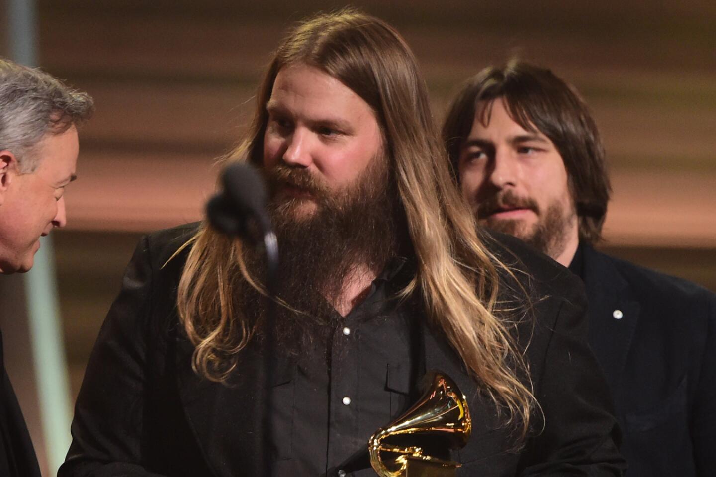 Chris Stapleton receives the Grammy country album for "Traveller" onstage.