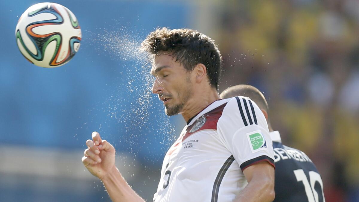 Germany's Mats Hummels heads the ball during his team's World Cup quarterfinal win over France on Friday.