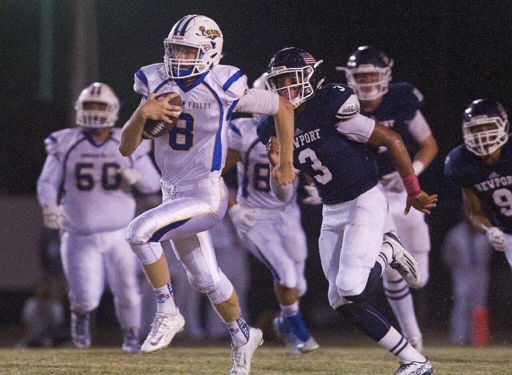 Fountain Valley High quarterback Chad Olberding rushed 26 times for 253 yards and four touchdowns, and he threw a 14-yard touchdown against Newport Harbor.