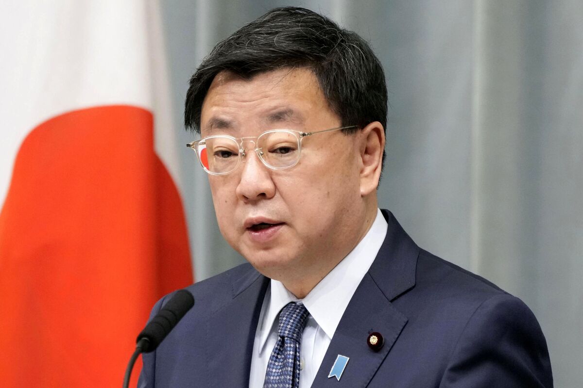 Japan's Chief Cabinet Secretary Hirokazu Matsuno speaks during a press conference in Tokyo, Wednesday, June 8, 2022. Japan’s top government spokesman on Wednesday called Russia’s announcement of suspending an agreement allowing Japanese fishing in waters near the disputed islands “regrettable” and that Tokyo will pursue negotiation so that Japanese boats can safely operate under the pact. (Kyodo News via AP)