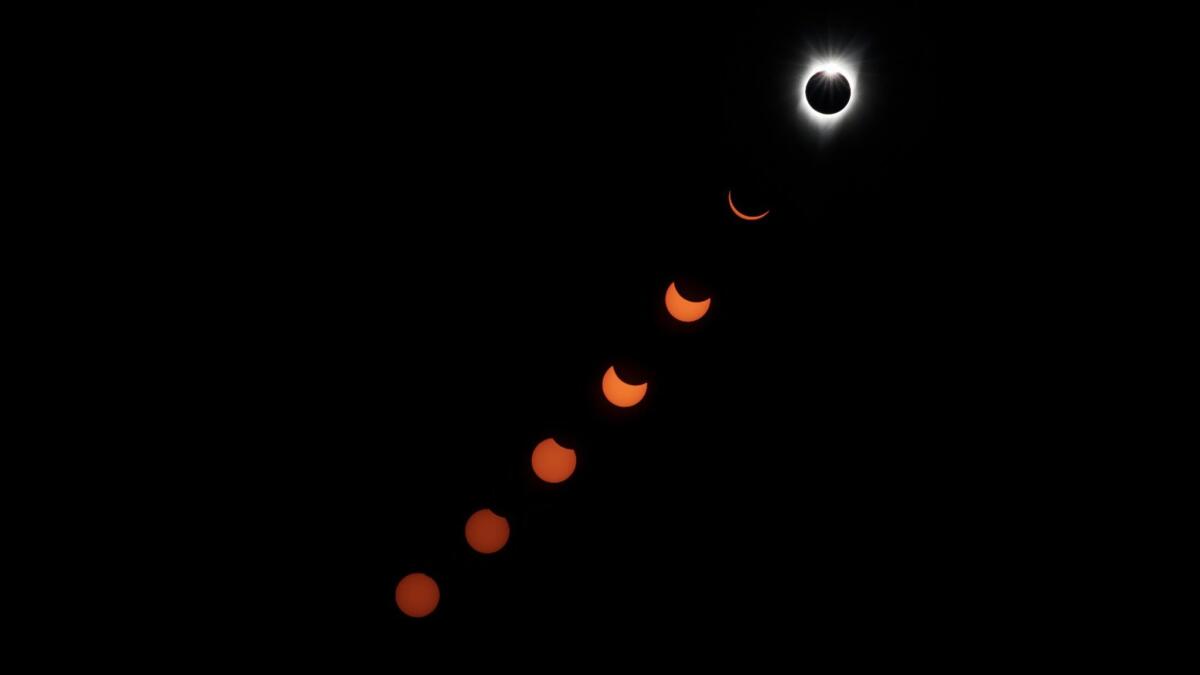 The various stages of Monday's solar eclipse are captured in a multiple-exposure image from Salem, Ore.