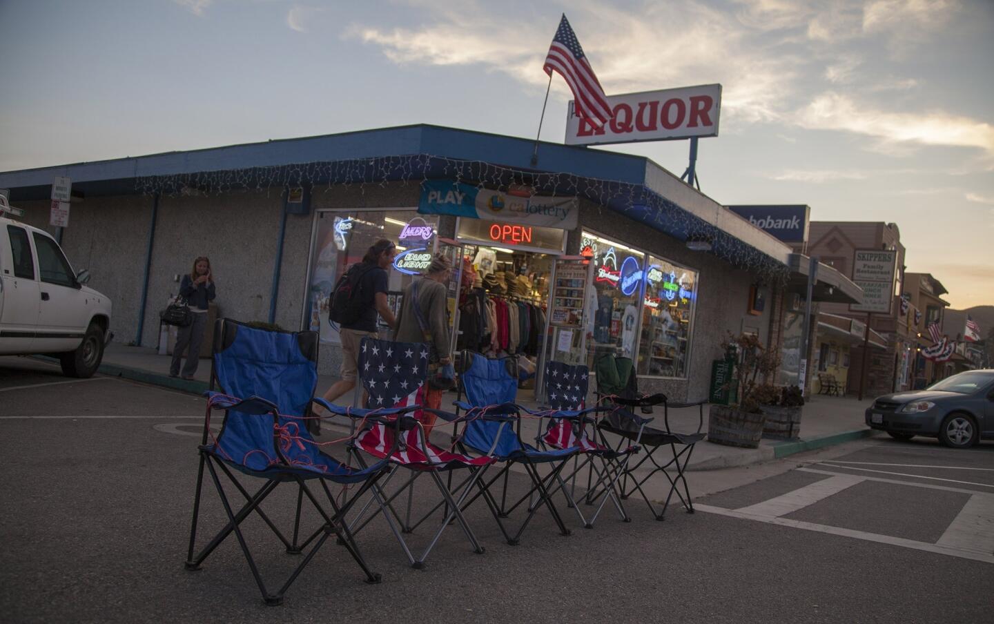 Many days before the Fourth of July celebration in Cayucos, locals and visitors reserve their parade-viewing spots along Ocean Avenue. The Cayucos Chamber of Commerce says 30,000 visitors will descend on the Central Coast community for the Independence Day parade, sand castle contest and fireworks.