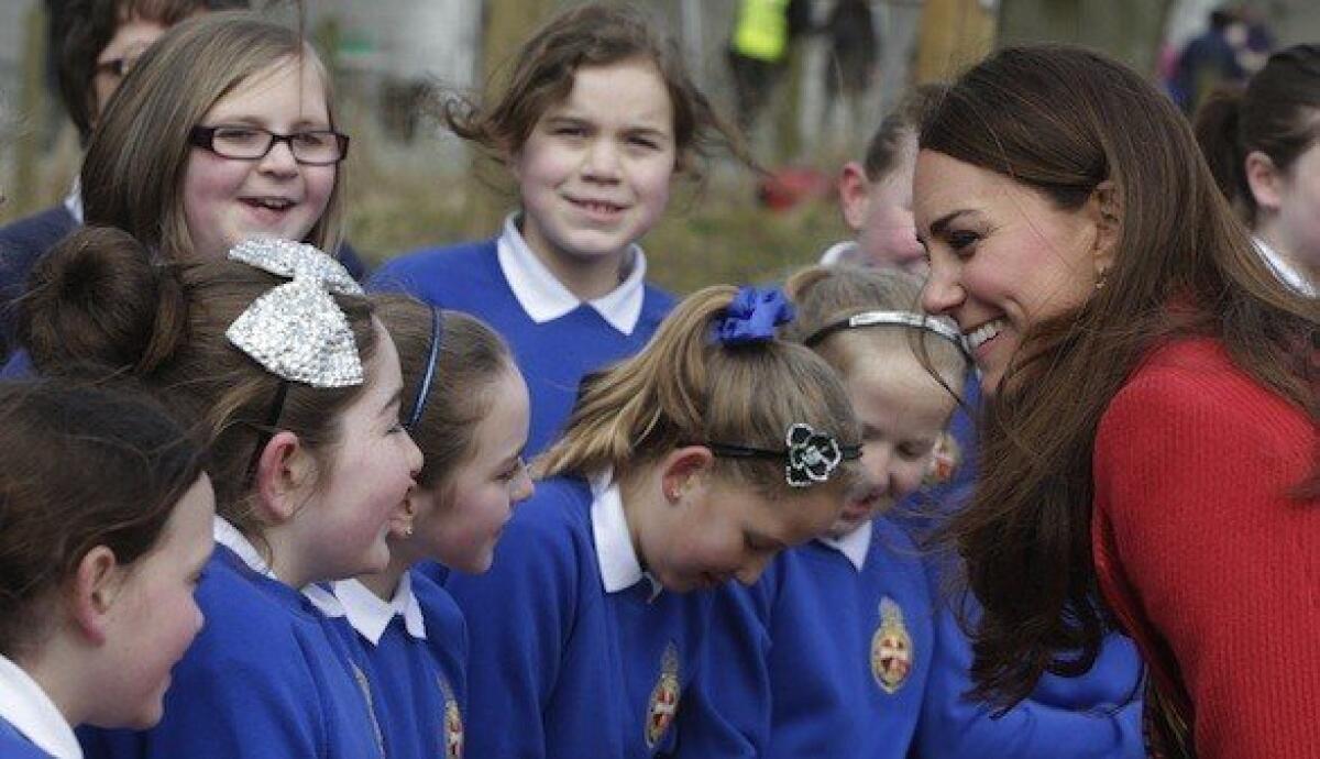 Kate Middleton, the Duchess of Cambridge, visits with schoolchildren in Ayrshire, Scotland.