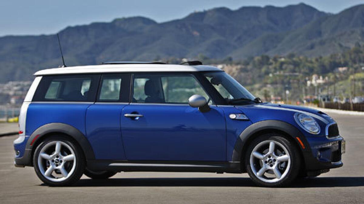 The new, three-door Clubman S (at 2,712 pounds) weighs 142 pounds more than the standard Cooper S and measures 155.8 inches, up a half-foot over the standard car, over a wheelbase stretched 3.1 inches.