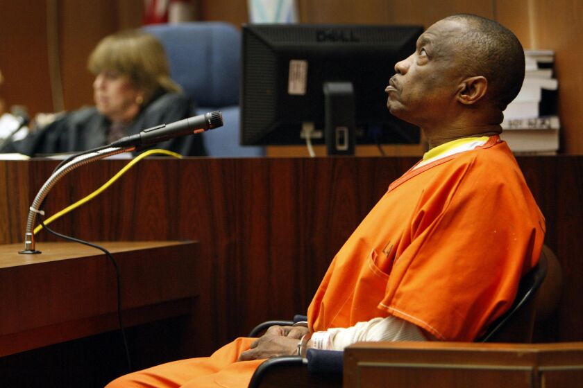 Lonnie Franklin Jr., who authorities say is the Grim Sleeper serial killer, answers questions from the witness stand in the Los Angeles County courtroom of Judge Kathleen Kennedy.