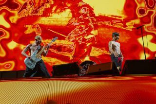 San Diego, CA - July 27: Red Hot Chili Peppers perform at Petco Park on Wednesday, July 27, 2022 in San Diego, CA. Anthony Kiedis and Michael Peter Balzary, known professionally as Flea. (Nelvin C. Cepeda / The San Diego Union-Tribune)