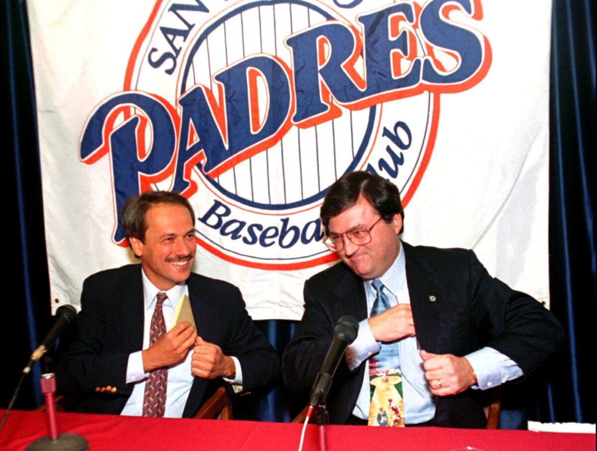 Larry Lucchino (left) and former Padres owner John Moores after finishing up their first news conference in 1995.